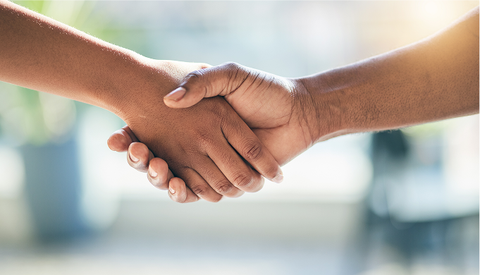 an image of a street with silos on the left and businesses on the right