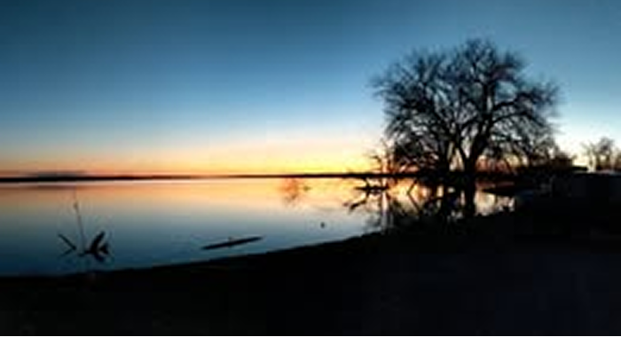 pond An image of a street with businesses lining it.